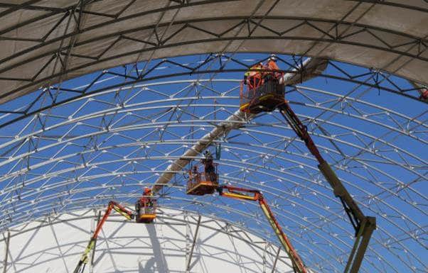 Installing fabric structures